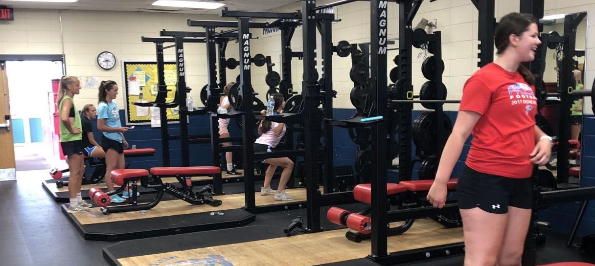 Lady Falcons in the weight room